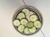 cucumber from my garden a cucumber, sliced, on a plate
